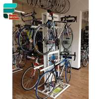 Meubles de décoration intérieure personnalisés pour magasin de vélos, présentoir mural pour magasin de vélos, présentoir de sol pour kit de cyclisme