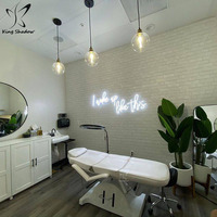 Tatouage facial rotatif hydraulique noir, lit de beauté, chaise de piercing, hauteur réglable