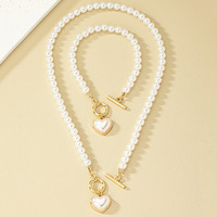 Ensemble de bijoux fantaisie vintage, collier ras du cou en perles baroques, pendentif cœur géométrique, bracelet pour femmes