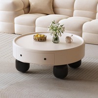 Table basse de style crème pour un salon minimaliste, petit appartement, table basse ronde moderne, simple et haut de gamme