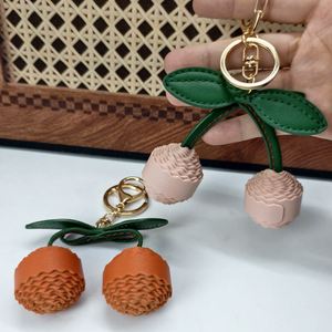 Fashion PU Leather Cherry Bag Charm Key Chains <b>Purse</b> Charm Pendant <b>Cute</b> Cherry Keychain for Women - Product Image 2
