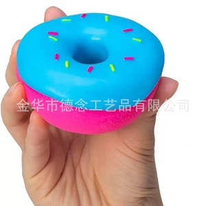 NeeDoh Dippin Dazzler Egg - un juguete divertido y antiestrés hecho de caramelo suave, con forma de donut. - Product Image 6
