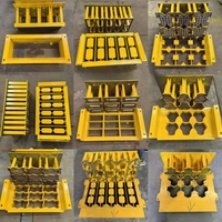 Petite machine de fabrication de blocs de pavé QT4-30B rentable, à pression hydraulique, fonctionnement automatique, économe en énergie, pour ciment