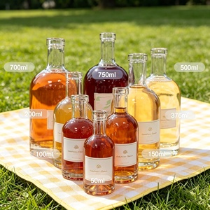 Botella de Vidrio Transparente de Diseño Redondo Clásico de 750 ml, 700 ml, 375 ml para Licor, Vodka, Whisky, Ginebra con Tapón de Corcho - Product Image 3