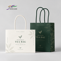Sac en papier de luxe pour bijoux avec poignée en corde, estampage à chaud, logo personnalisé pour emballage cadeau de boutique