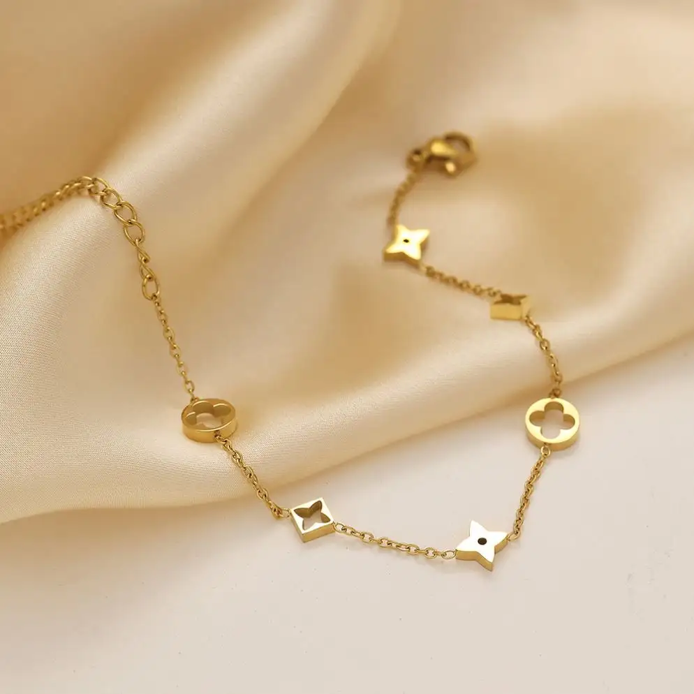 Acier Inoxydable Trendy Women Stainless Steel Hollow Four Leaf Clover 18K Gold Plated Chain Bracelet