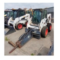Kubota Bekas untuk Mini Skid Steer Backhoe Loader 4x4 Pompa Hidrolik Kawasaki 50KW Daya 748kg dengan Bucket Penggali
