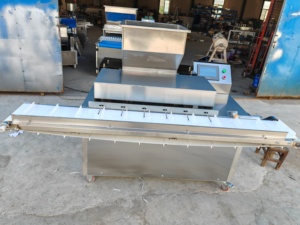Nouvelle machine automatique <span class=keywords><strong>en</strong></span> acier inoxydable pour le remplissage de croissants, de pains grillés, de pains fourrés <span class=keywords><strong>au</strong></span> <span class=keywords><strong>chocolat</strong></span>, de pains de <span class=keywords><strong>boulangerie</strong></span> et <span class=keywords><strong>d</strong></span>'éclairs à la crème - <span class=keywords><strong>prix</strong></span> - Product Image 1