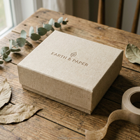 Boîte cadeau rigide de luxe personnalisée en lin texturé avec logo en feuille d'or, solution intégrée pour les cadeaux de Noël