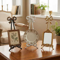 Nouveau support de présentation en métal avec nœud papillon, style nordique moderne, pour décoration de table, mini chevalet, cadre en fer robuste pour la décoration intérieure