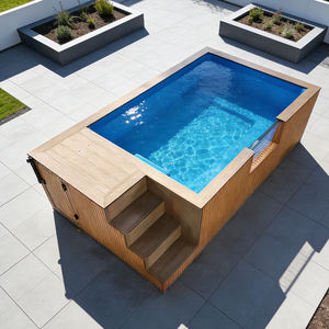 Piscine formelle avec un design symétrique et des aménagements paysagers ornementaux - Product Image 1