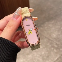 Montre pour femme au design de lapin ovale de dessin animé, couleurs contrastées mignonnes, bracelet tressé élastique, mouvement à quartz, boîtier en alliage