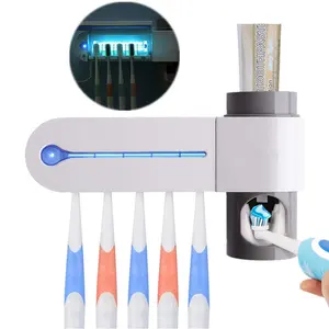 סיטונאי 99.9% מעולה באיכות ABS חומר קיר רכוב אוטומטי Uv מברשת שיניים Santilizer עם בעל