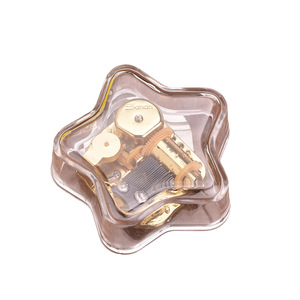 Boîte à musique en acrylique transparente en forme d'étoile, à remonter, mouvement doré, cadeau de Saint-Valentin, Noël, anniversaire, vente en gros - Product Image 1