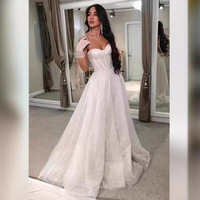 Robe de mariée LY-WD0556 robe de mariée paillettes brillantes dentelle jupe de mariée Spaghetti sangle haut sans manches corset dos nu brosse train