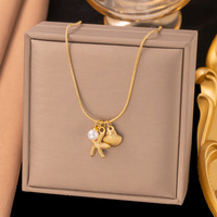 Collier pendentif en forme de cœur de papillon en acier inoxydable plaqué or 18 carats pour femmes et hommes, collier ras du cou, bijoux