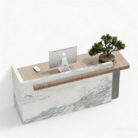 Comptoir de réception de bureau de luxe en pierre, design unique, bureau de réception incurvé