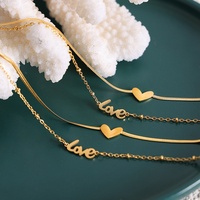 Bijou de pied haut de gamme d'été, style populaire des influenceurs en ligne, pendentif double couche en acier titane en forme de cœur et de lettre, pour la cheville