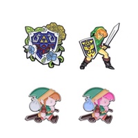 En gros, Pin's métalliques de dessin animé, Badges et Broches souvenirs avec logos artistiques, sur le thème de la Légende de Zelda Breath of the Wild et du Bouclier des Larmes du Royaume de Link