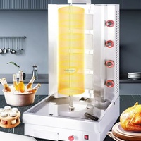 Machine commerciale de Shawarma de charbon de bois Machine de 4 brûleurs Mini Shawarma Machine automatique de Shawarma