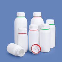 Kundenspezifische 200ml 250ml 300ml 400ml 500ml 1L weiße Kunststoff-Coex-Flasche mit rot-grünem Farbring um den Verschluss