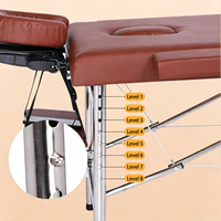 Table de massage pliante de haute qualité pour la beauté et la thérapie, idéale pour masser en regardant son téléphone portable