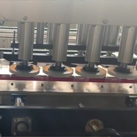 Machine de remplissage, de bouchage et d'emballage semi-automatique économique et personnalisable pour bouteilles PET de 500 ml, 1 L, 2 L (lait, yaourt, jus de fruits)