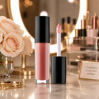 Gloss à lèvres liquide brillant format voyage, teinté or, haute brillance, non collant, formule hydratante, applicateur doe-foot, longue tenue, confort optimal