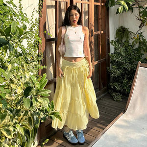 Jupe midi trapèze jaune crème estivale avec détail nœud, style gâteau à étages, pour femme, tendance et élégante - Product Image 1