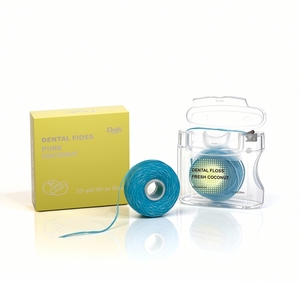 Filo Interdentale Quotidiano all'Olio di Cocco 30M PE Vegano Cruelty-Free Senza PFAS Aroma Menta Certificato GMP per Denti Puliti - Product Image 1