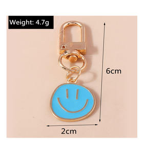 Métal Émail Sourire <span class=keywords><strong>Expression</strong></span> Heureux Visage Souriant Porte-clés Porte-clés Pour Écouteur Cas Bourse Décoration - Product Image 6