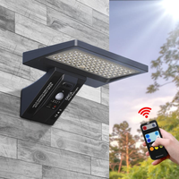 Lampe LED solaire d'extérieur Télécommande étanche 4 modes Capteur de mouvement solaire Support mural pour jardin cour garage