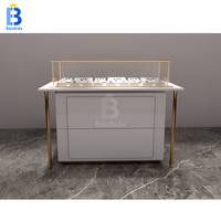 Table de présentation de bijoux de luxe minimaliste avec vitrine et armoire de rangement pour magasin de bijoux haut de gamme