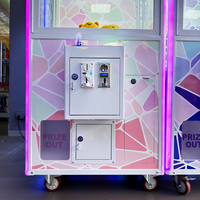 Machine à griffes d'arcade avec carte mère stable et contrôle de tension de précision pour un fonctionnement fiable dans les centres commerciaux
