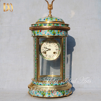 Horloge mécanique de luxe en laiton incrusté d'émail cloisonné pour la décoration intérieure de la maison