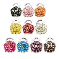 Porte-sac à main portable pour femme, crochet de table, support en alliage de zinc, forme de fleur, accessoire de sac pliable
