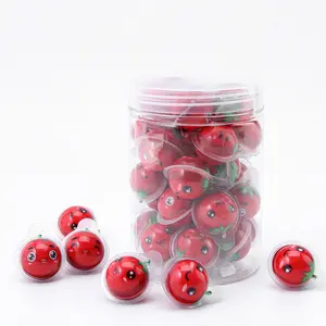 Bonbons ronds de bande dessinée Bouteille de bonbons doux saveur de fruits Boule remplie de confiture Bonbons gommeux