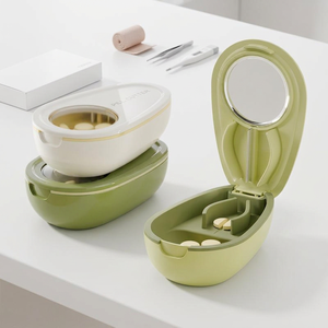 เครื่องตัดยาพร้อมกล่องเก็บยา วัสดุซิลิโคนสีเขียวสำหรับเก็บยา - Product Image 3