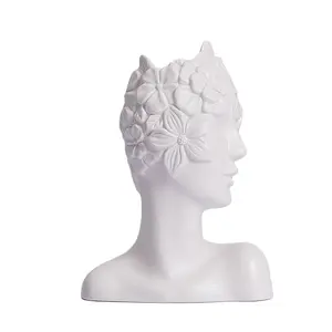 美的な白い艶をかけられたセラミック顔の花瓶中型のファッショナブルな化粧ブラシコンテナホームオフィスの装飾花の植木鉢