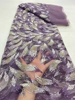 Tissu en dentelle de tulle de luxe brodé de fleurs brillantes avec des perles et des paillettes, 100% polyester