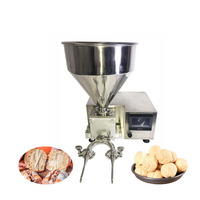 Machine multifonctionnelle pour l'injection de confiture au chocolat et le remplissage de choux à la crème