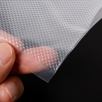 PA PE matériau de qualité alimentaire haute barrière feuilles de plastique transparentes co-extrusion en relief sac sous vide rouleau Film