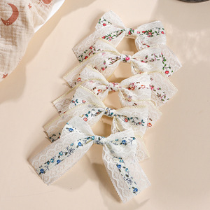 Fermaglio per capelli <span class=keywords><strong>con</strong></span> fiocco stampato a forma di fiore principessa per bambine - Product Image 1