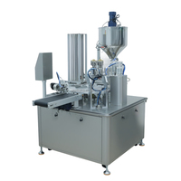 Machine d'emballage automatique rotative à double tête pour sauces liquides et pâtes, idéale pour le remplissage et la scellage des coupelles de sauce – Offre Spéciale