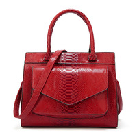 Venta al por mayor Patrón de serpiente Pu Bolso de cuero Moda Simple y atmosférico Señoras Bolso de mano de piel de serpiente
