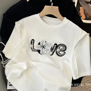 Vente en gros 2024 été nouveau 3D fleur lettre paillettes gland col rond manches courtes couleur unie femmes T-shirts