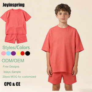 Ensemble d'été décontracté et sportif pour garçons et filles : Haut ample à manches courtes et short uni corail - Product Image 1