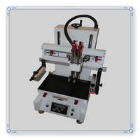 Machine d'impression sérigraphique semi-automatique économique de table avec table de travail sous vide pour l'impression sur tissu