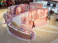 Kiosque de beauté pop-up personnalisable pour événements de vente de cosmétiques roses, présentoir de cosmétiques pour l'activation de marque et la conception de stand d'exposition
