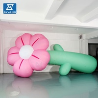 Modèle de fleur gonflable géante rose personnalisée pour la publicité et la décoration d'activités dans les espaces scéniques extérieurs